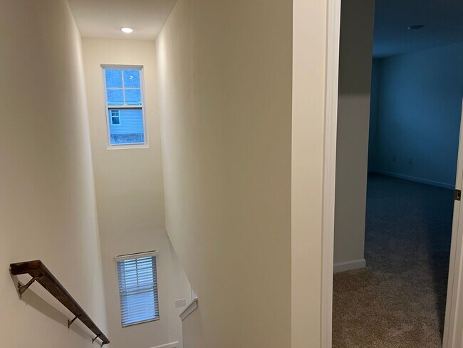 Building Photo - Beautiful New Construction 3 bedroom 2.5 Condo   with garage- Water, trash & sewer incuded!