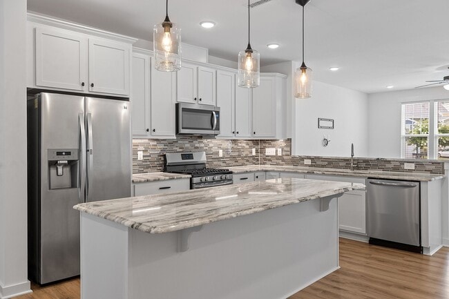 Building Photo - 3 Bedroom Townhome with Rooftop Terrace in Downtown Wake Forest!