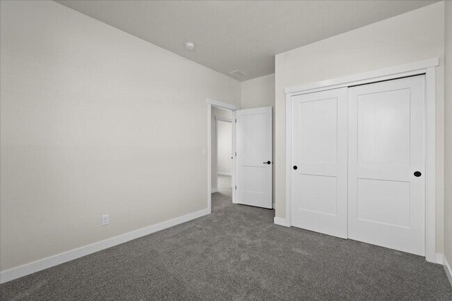 Building Photo - Spacious 4-Bedroom Home with Modern Comforts