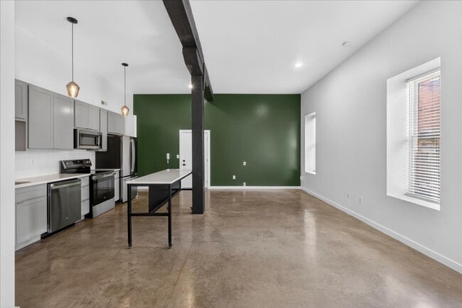 Building Photo - Green with Enby