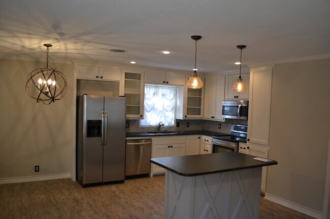 Building Photo - Move In Special!! - 1/2 Off 1st Months Ren...