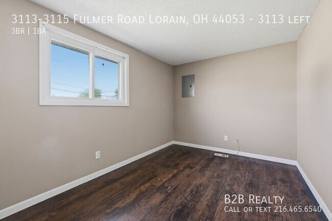 Building Photo - 3113-3115 Fulmer Road Lorain, OH 44053-3113 left