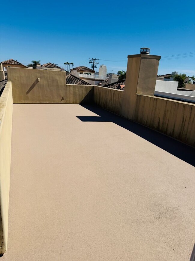 Building Photo - Elevated Coastal Living in Downtown Huntington Beach with Private Rooftop Retreat