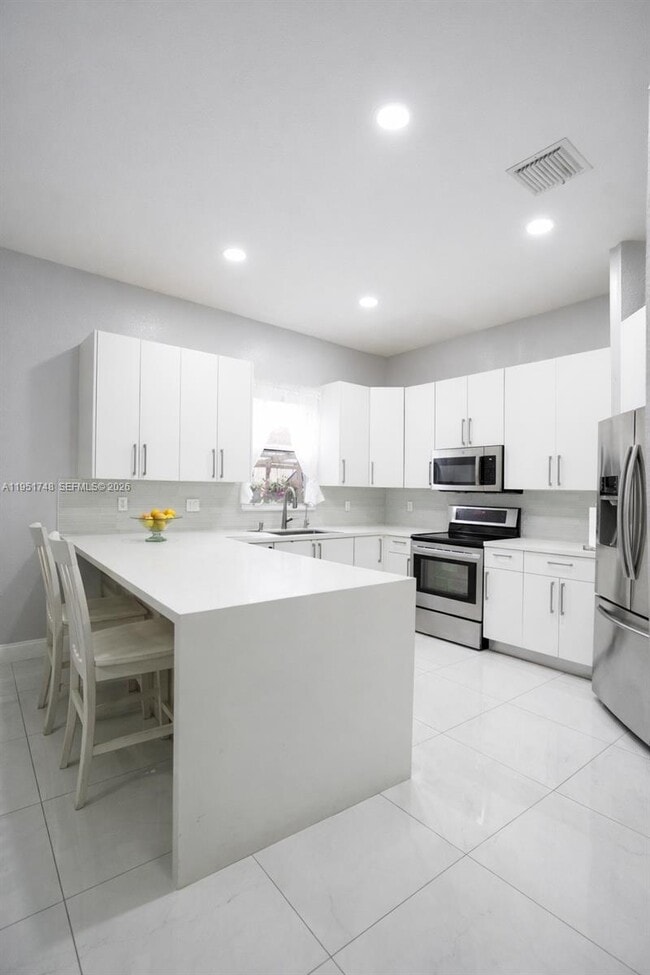 Building Photo - 12869 SW 50th Ct