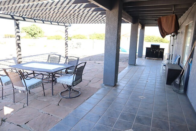 Building Photo - Home With A Pool and Much More!