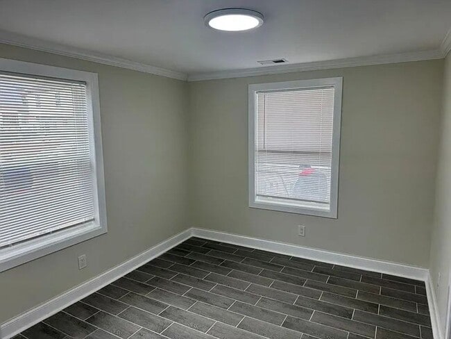 Building Photo - NEWLY REBUILT ONE LEVEL LIVING SPACE