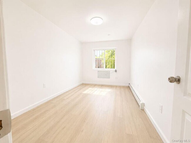 Building Photo - 90-17-90-56 56th Ave