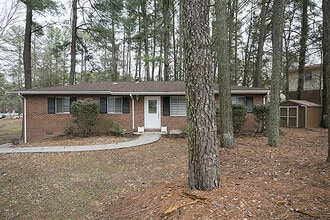 Building Photo - Charming Brick Ranch on a Spacious, Wooded...