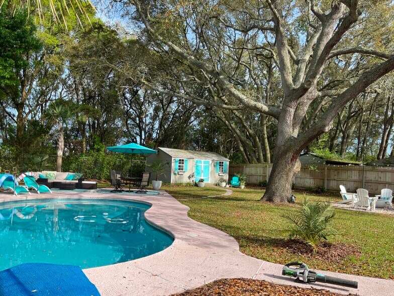 Pool, storage shed and lighted fire pit area - 716 S 15th St
