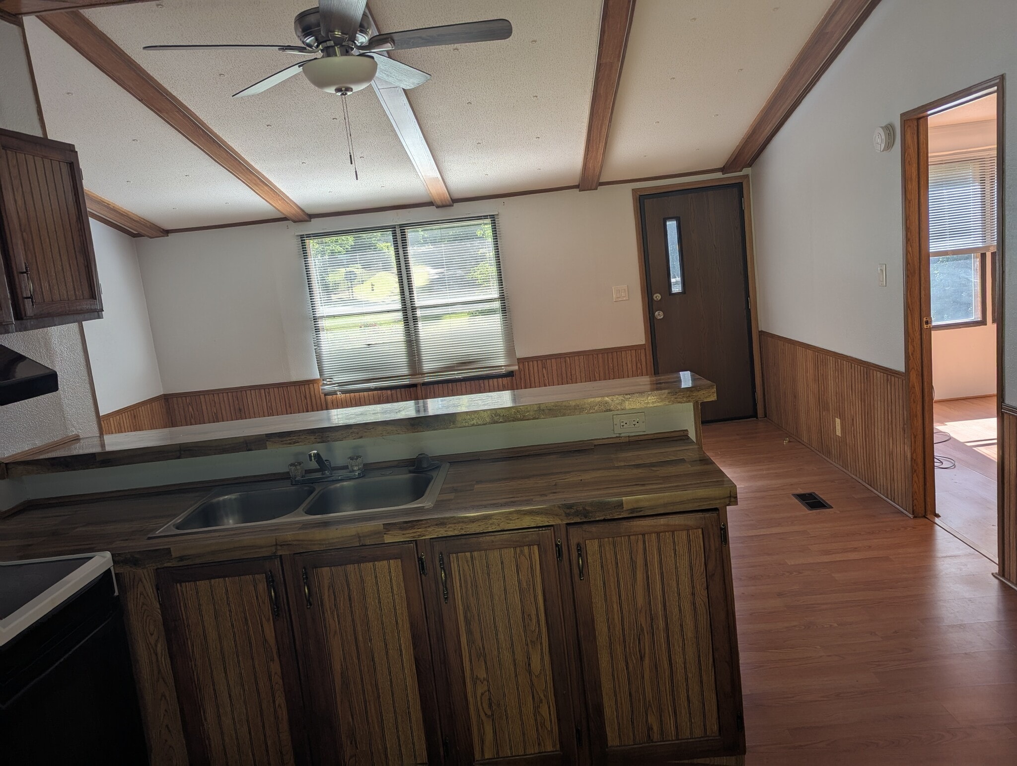 Kitchen view into main room - 12619 Wildlife Ln