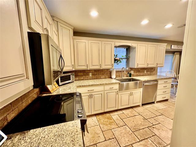 Building Photo - 7812 Woodharbor Dr