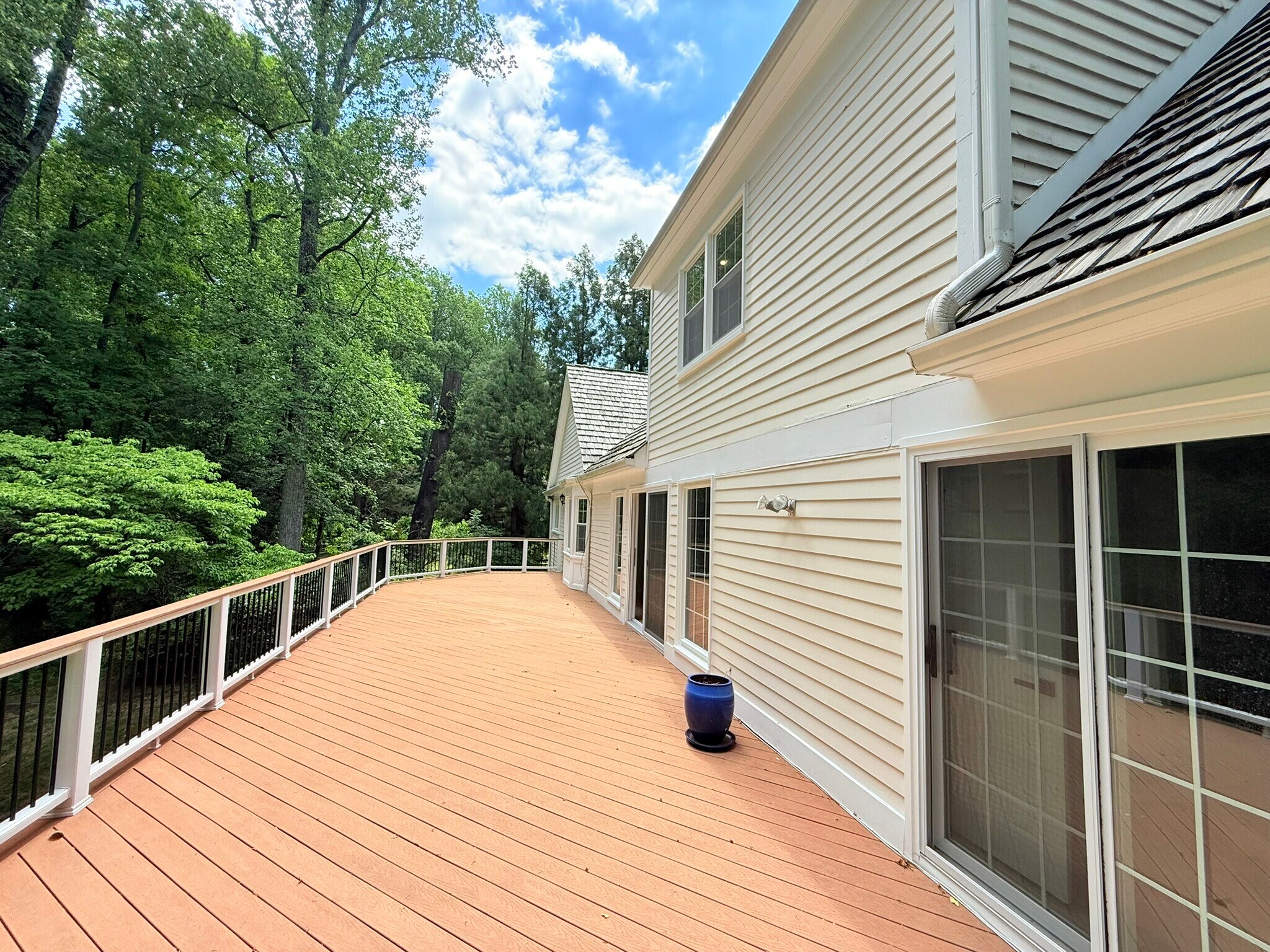 Large deck overlooking private wooded lot and yard - 9248 Wood Glade Dr