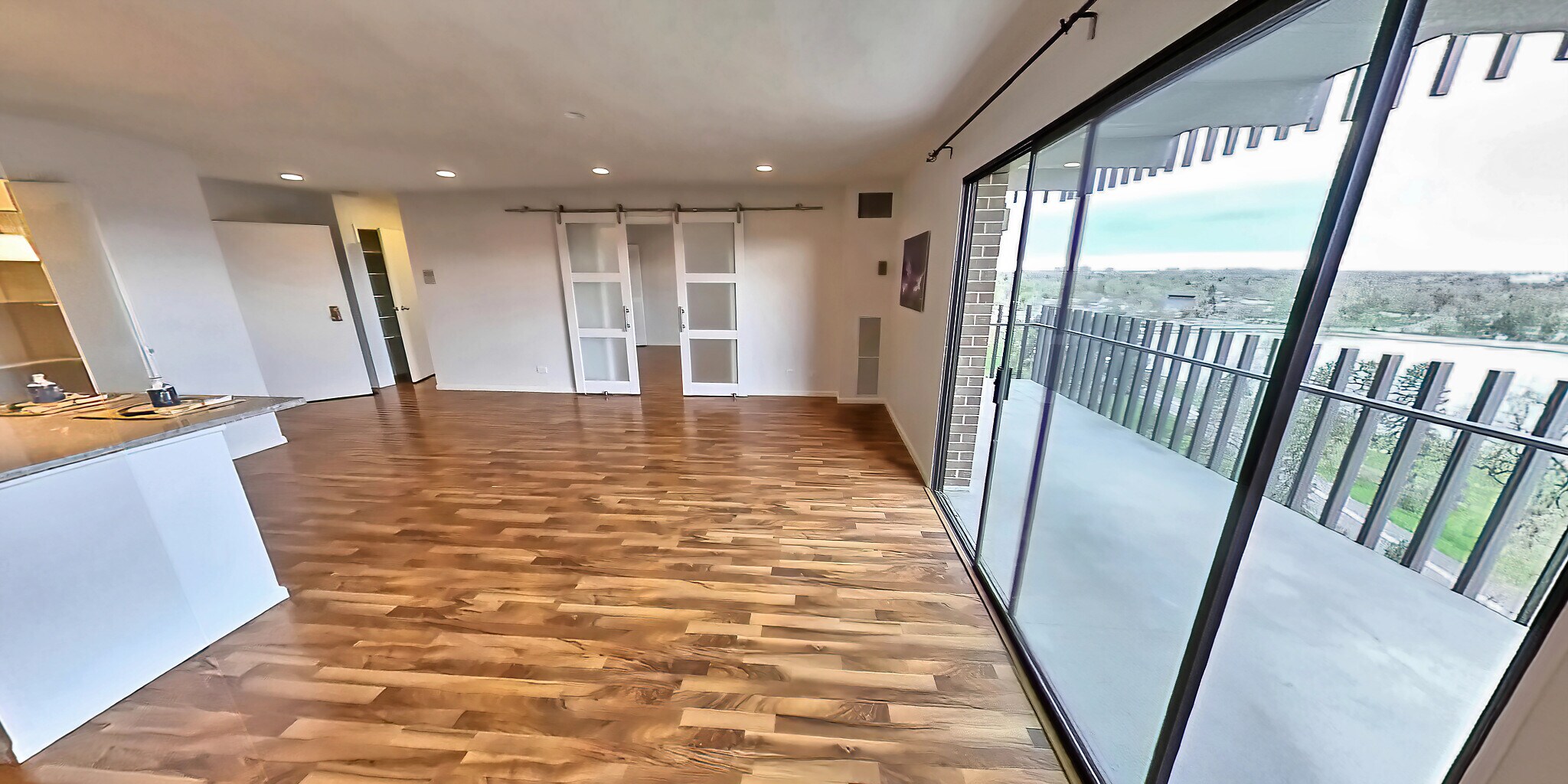 Living room with barn doors - 480 S Marion Pky