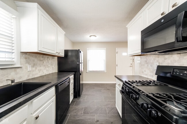 Building Photo - 6667 E 17th St