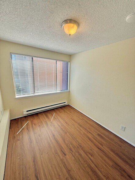 Building Photo - 4259 8th Ave NE