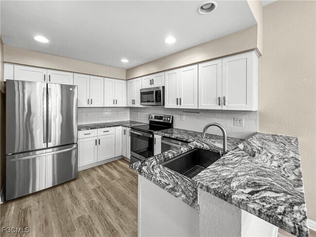 Building Photo - 16285 Coco Hammock Way