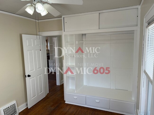 Building Photo - 4+ Bedroom, 2 Bath House with Garage and Fenced Backyard