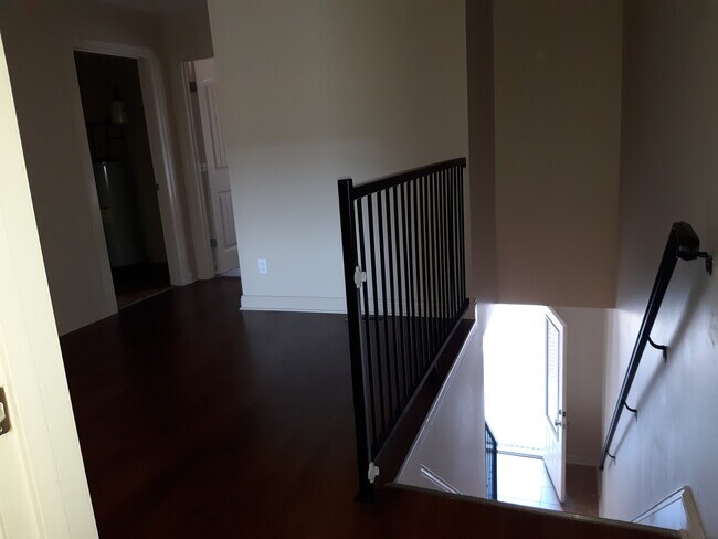 top of stairs, game room or office - 1445 N 3rd St