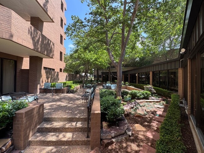 Building Photo - Experience Luxury and Prestige at Yorktown Condominiums