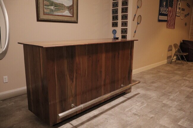 Building Photo - Expansive Mostly-Furnished Residence featuring 3 Bedrooms, a Completed Basement, and a Loft Space