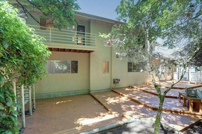 Building Photo - 4+ Bedroom with Great Entertaining Wrap Around Decks with VIEW of PUGET SOUND!!