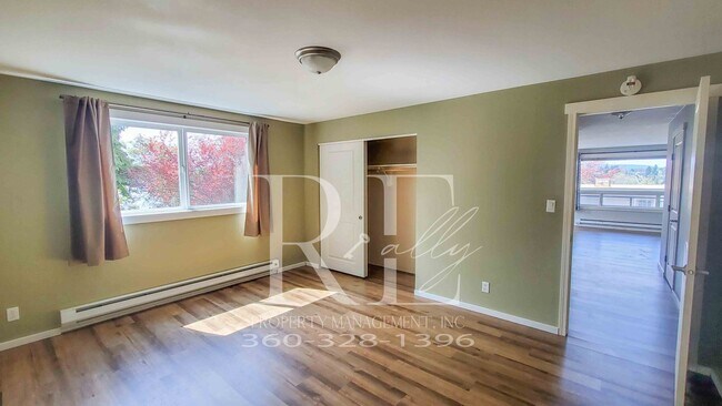 Building Photo - Modern Manette 1BR Condo with Private Pati...