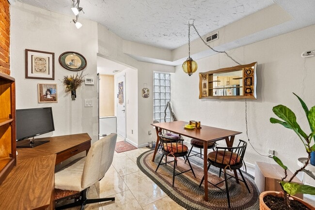 Building Photo - Charming Row Home | 2 Bed | 1 Bath | 950 Sf | Fenced Backyard | 2 Surface Parking Spaces