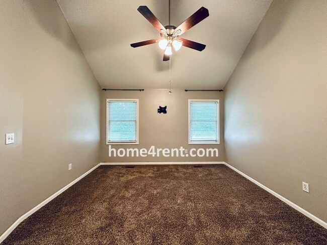 Building Photo - Blue Valley Schools w/ Wood Floors, Finished Basement and a Peaceful, Private Fenced Yard!