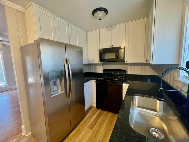 Building Photo - Welcome to Burgess2937, A Newly renovated charming 2-bedroom, 1-bathroom Duplex located in the vi...