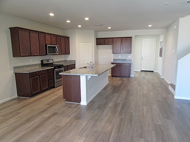 Building Photo - Spacious 5-Bedroom Home with Loft, Solar P...