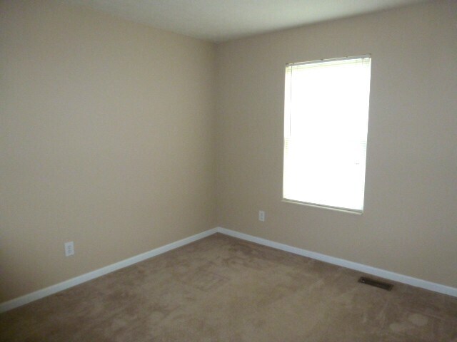 Building Photo - 1004 Wild Flower Ln
