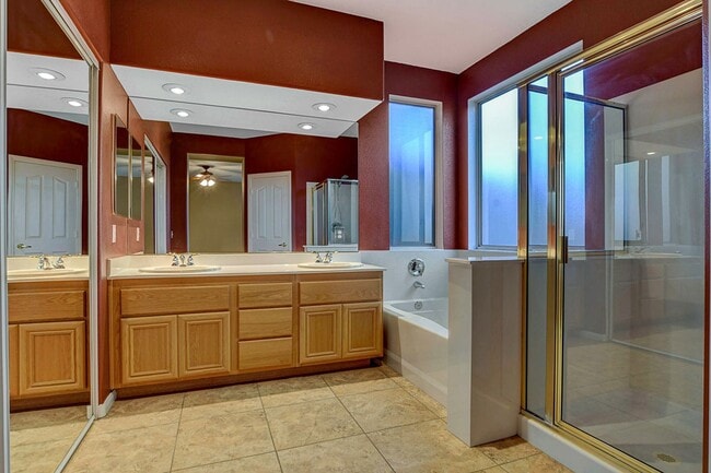 Building Photo - Gorgeous NW Single Story! 3 Car Garage! Serene Backyard.