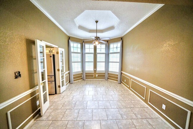 Building Photo - Executive Home in Greenshire with Luxurious Updates and Spacious Outdoor Living - Agent Commissio...