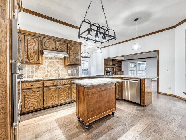 Building Photo - 4 Bedrooms - 3 Bathrooms - 3 Car Garage - ...