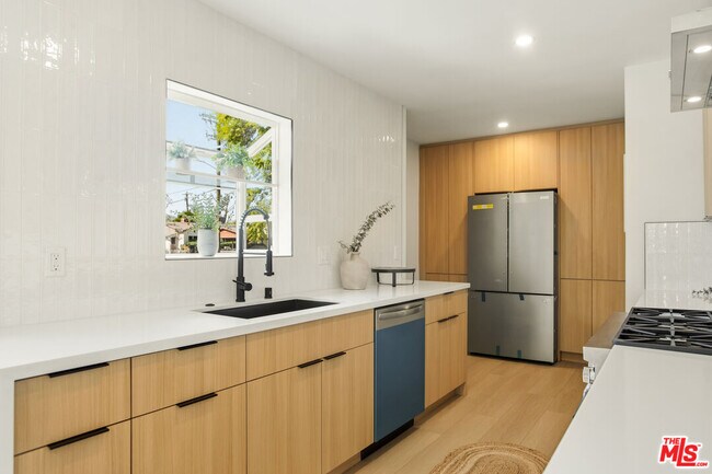 Building Photo - 7358 Paso Robles Ave