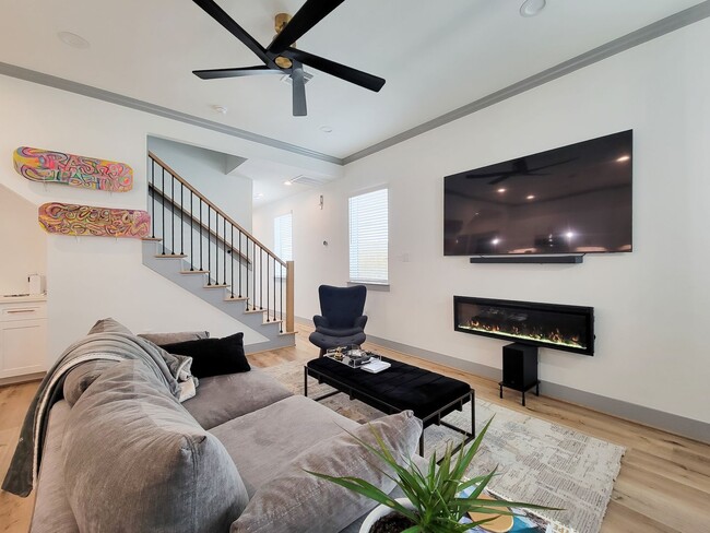 Building Photo - This 4-bedroom, 3-bathroom, two-story residence comes with a generous two-car attached garage. Re...