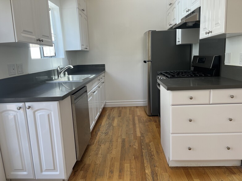 NEW KITCHEN CABINETS - 11037 Ohio Ave