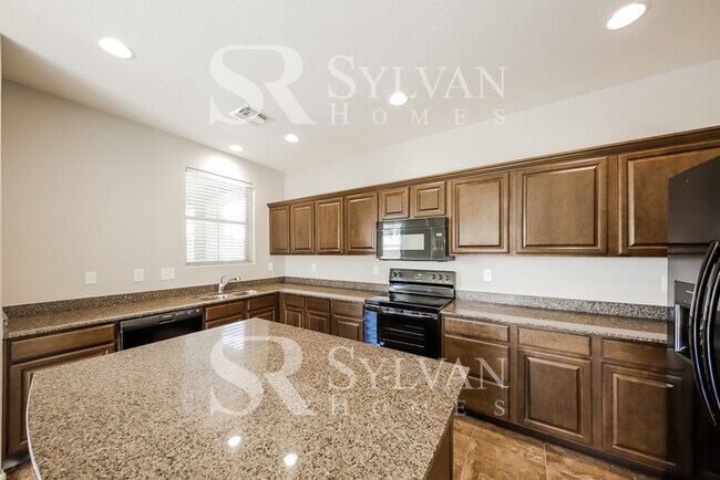 Building Photo - This home exudes a cheerful and welcoming charm!