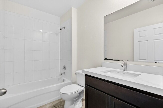 Building Photo - Renovated 4 Beds 2 Baths Single Family on Over a QTR Acre lot | Huge Yard