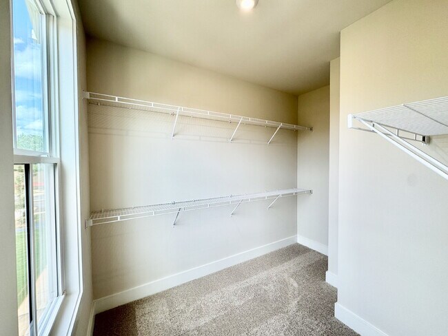 Building Photo - Your Alpharetta Retreat Awaits – Elegant T...