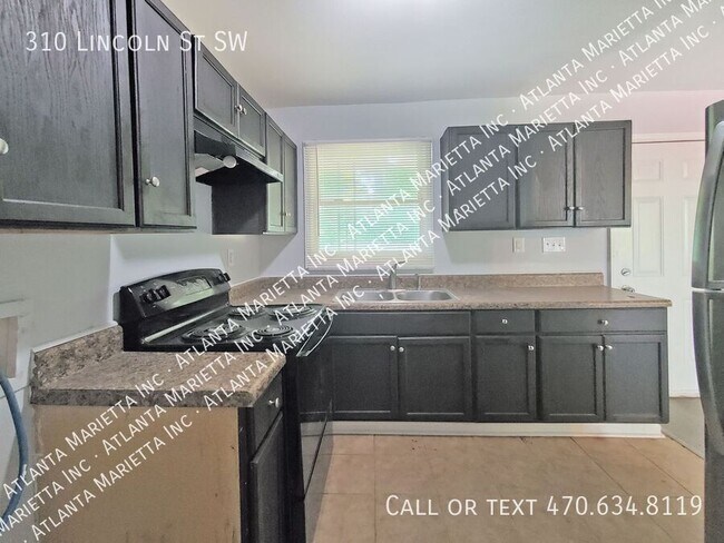 Building Photo - 310 Lincoln St SW