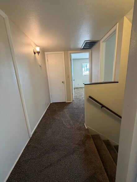 Hallway Between Bedrooms - 121 E 14th Pl