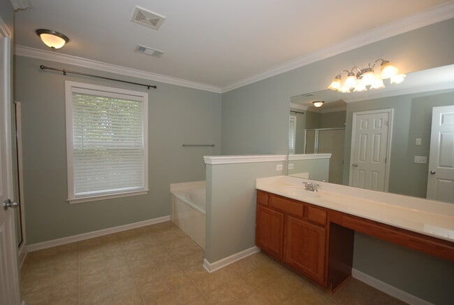 Building Photo - Oversized Executive Style Home with Finish...