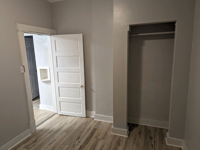 2nd bedroom, new ceiling fan, and flooring - 834 N Elizabeth St