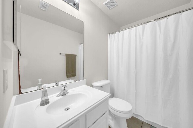 Building Photo - A beautifully maintained 3 bedroom, 2.5 bath home offering modern comfort in a quiet, desirable c...