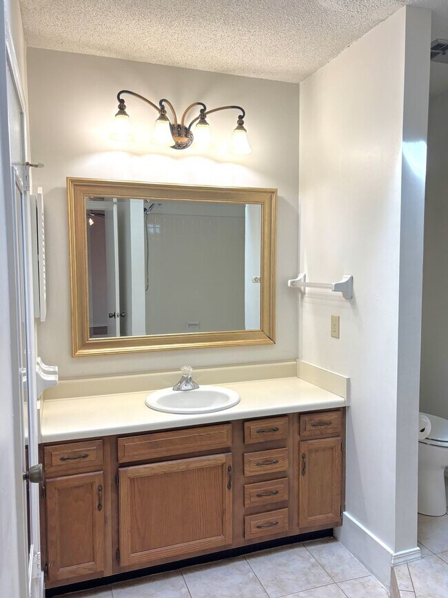 Building Photo - Two bed / Two bath condo off Grelot Road