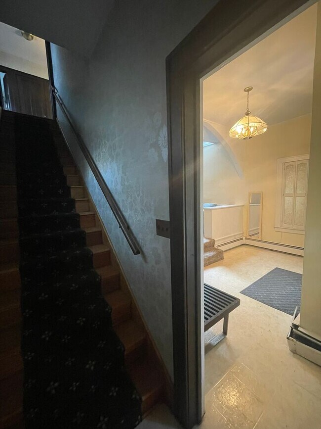 Building Photo - One Block to the Diag! Charming Home with Private Courtyard + Parking