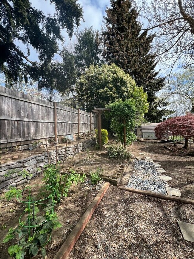 Building Photo - Professional Photos Coming Soon | Your Mt. Tabor Oasis: Huge Yard, Oversized Shop-Garage & Sun-Dr...