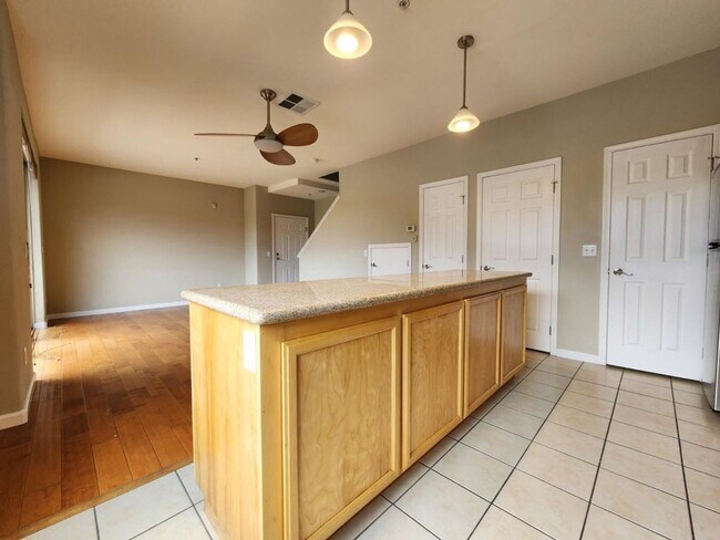 Building Photo - Modern 2BR/2.5BA Condo with Ensuite Bathro...