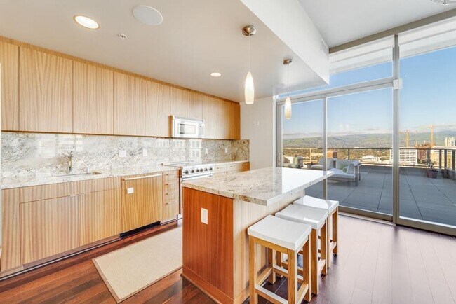 Building Photo - Gorgeous 3 Bedroom Condo with Huge Outdoor Space at Axis